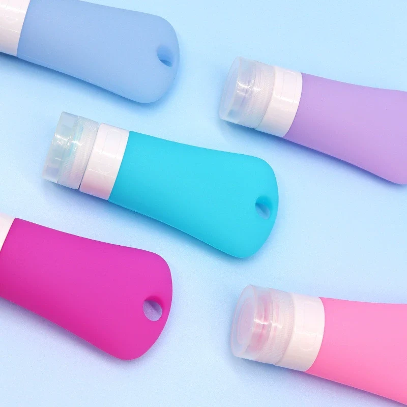 Bouteille de voyage en silicone en forme de trou translucide de 90 ml